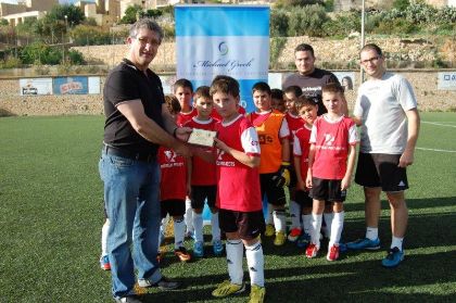 Mr Michael Grech presenting token